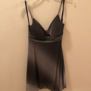 Graduated gray dress with handkerchief bottom.